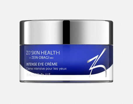 Close up product photo of ZO Skin Health Intense Eye Crème blue container with a silver lid