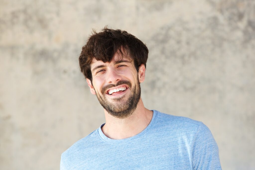 close up smiling handsome man FYZ2EPK close up smiling handsome man FYZ2EPK