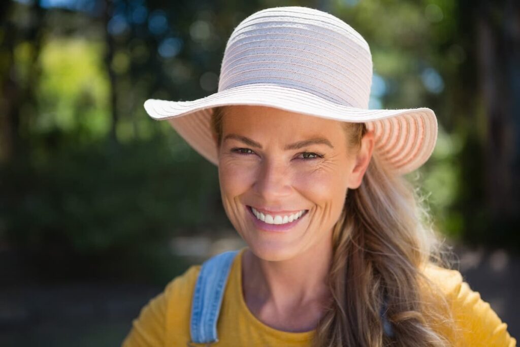 1739910072 portrait of smiling woman wearing hat E7X5ZX7 1 1739910072 portrait of smiling woman wearing hat E7X5ZX7 1