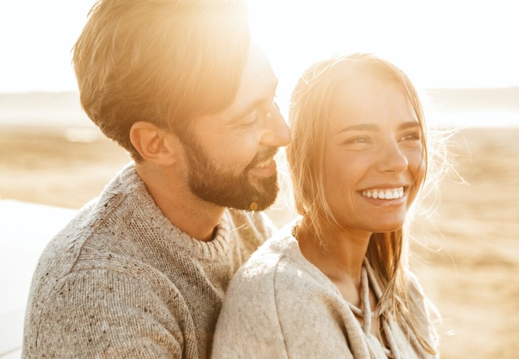 close up of a smiling beautiful young couple 9W4U9KG close up of a smiling beautiful young couple 9W4U9KG
